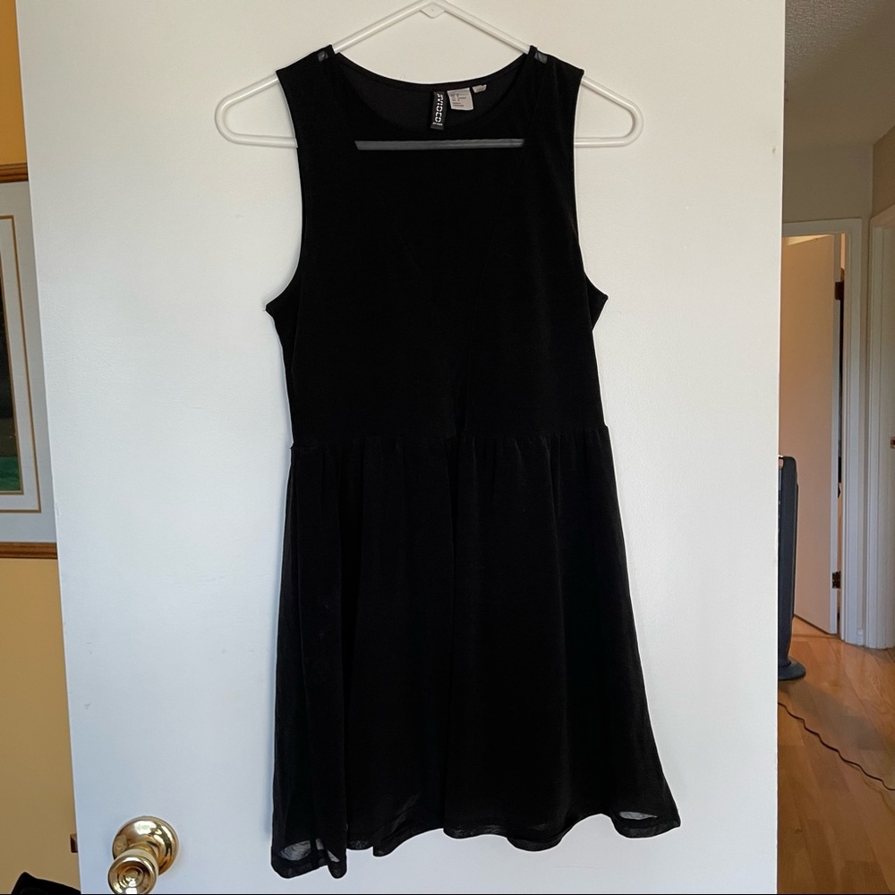 H&M black A line dress with mesh front V size 8